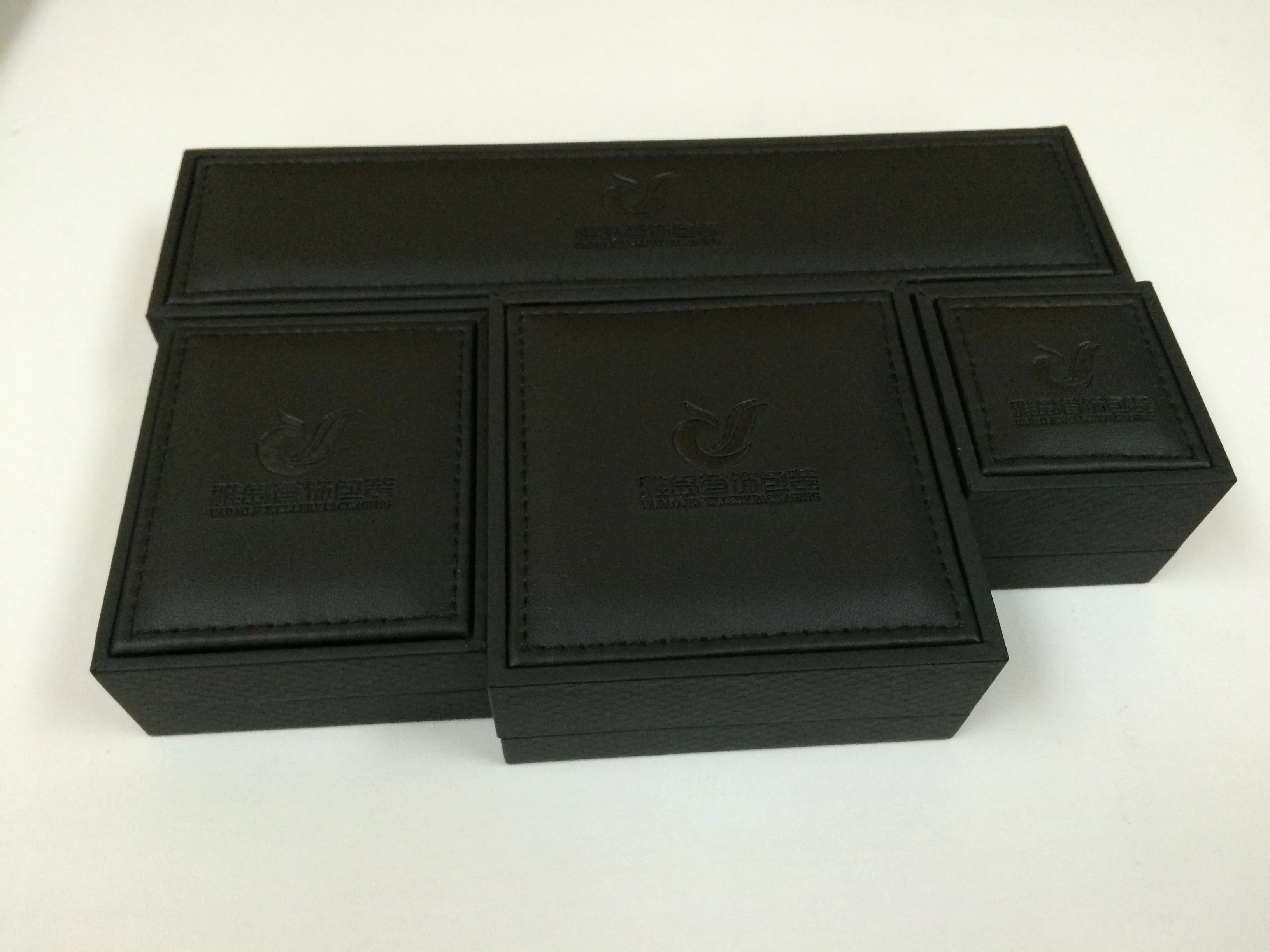 Luxury Set Leather Custom Logo Printed Jewelry Boxes Gift Box Manufactory plastic shell Leatherette paper jewelry box accept customize color/material