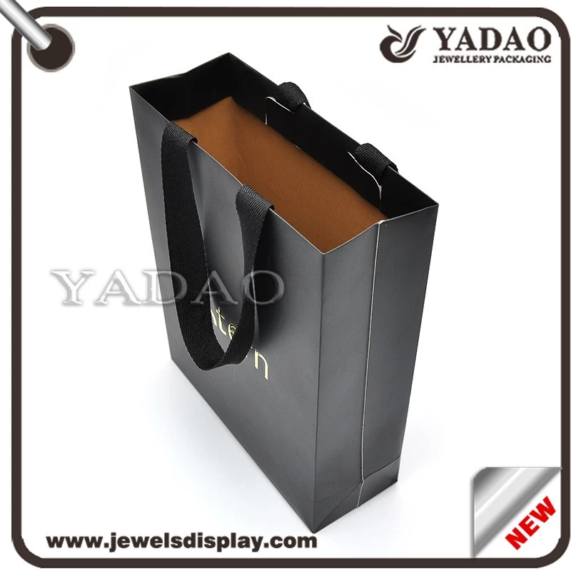 Luxury classic black paper shopping bags with gold hot stamping logo for shop and shopping mall party favors paper packing bags