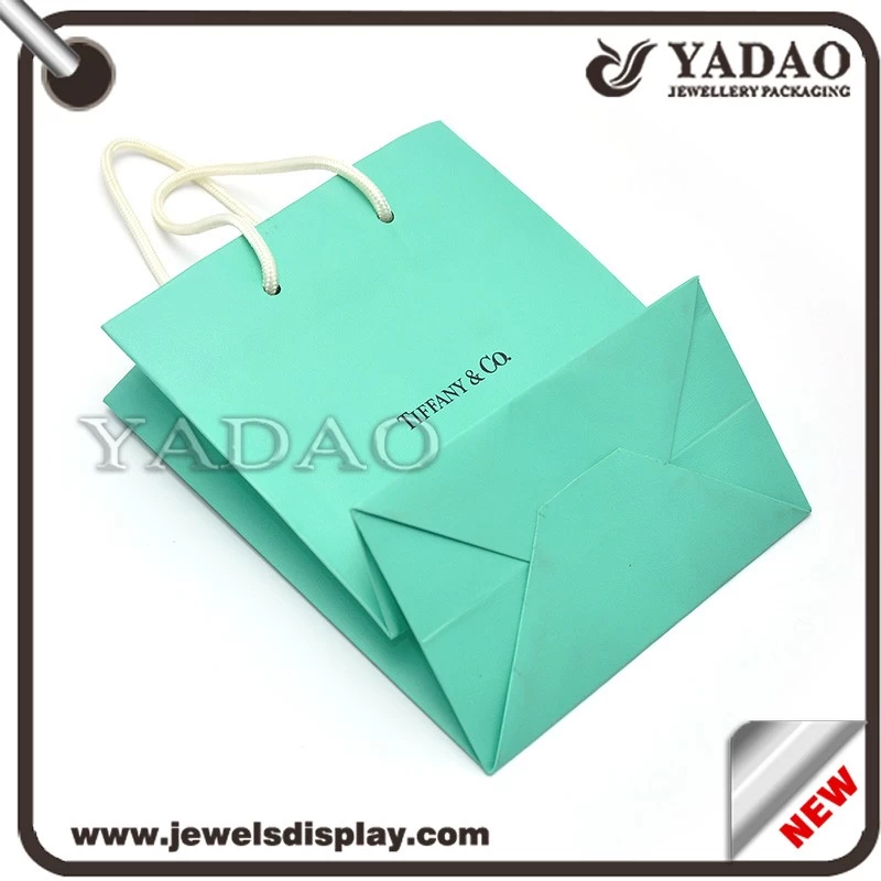 Most popular blue paper jewelry bag with handstring and your logo