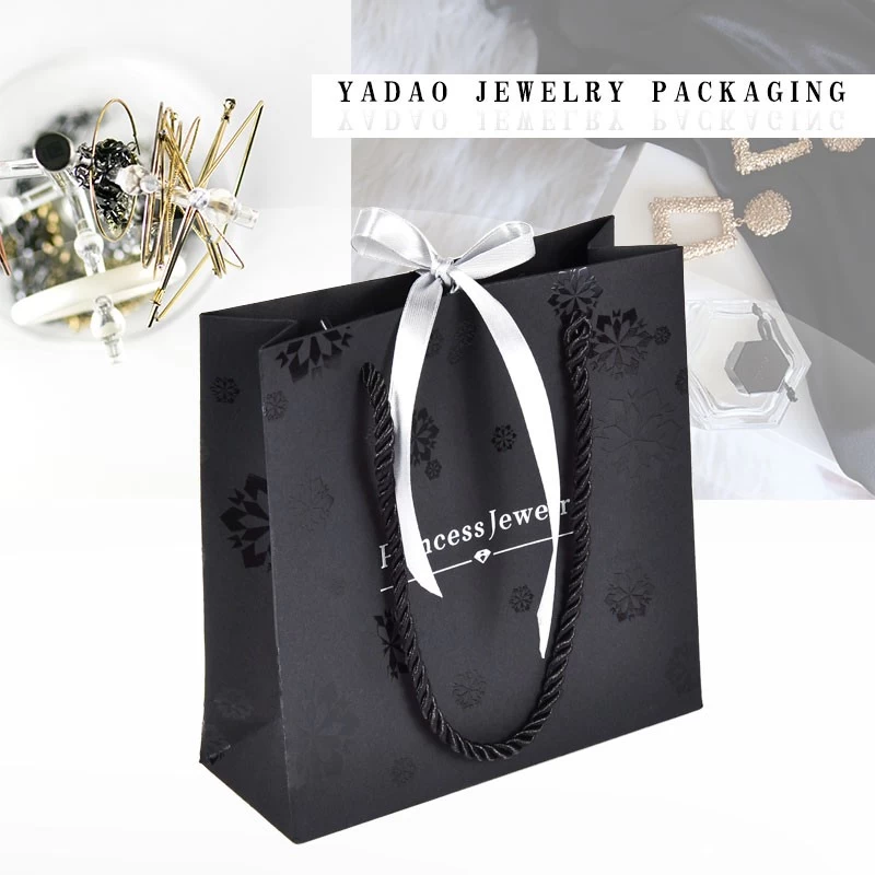 YADAO  Luxury Holiday Bag Custom Logo Black Color CMYK New Design Cartoon Paper Bag for Clothes Gift Shopping