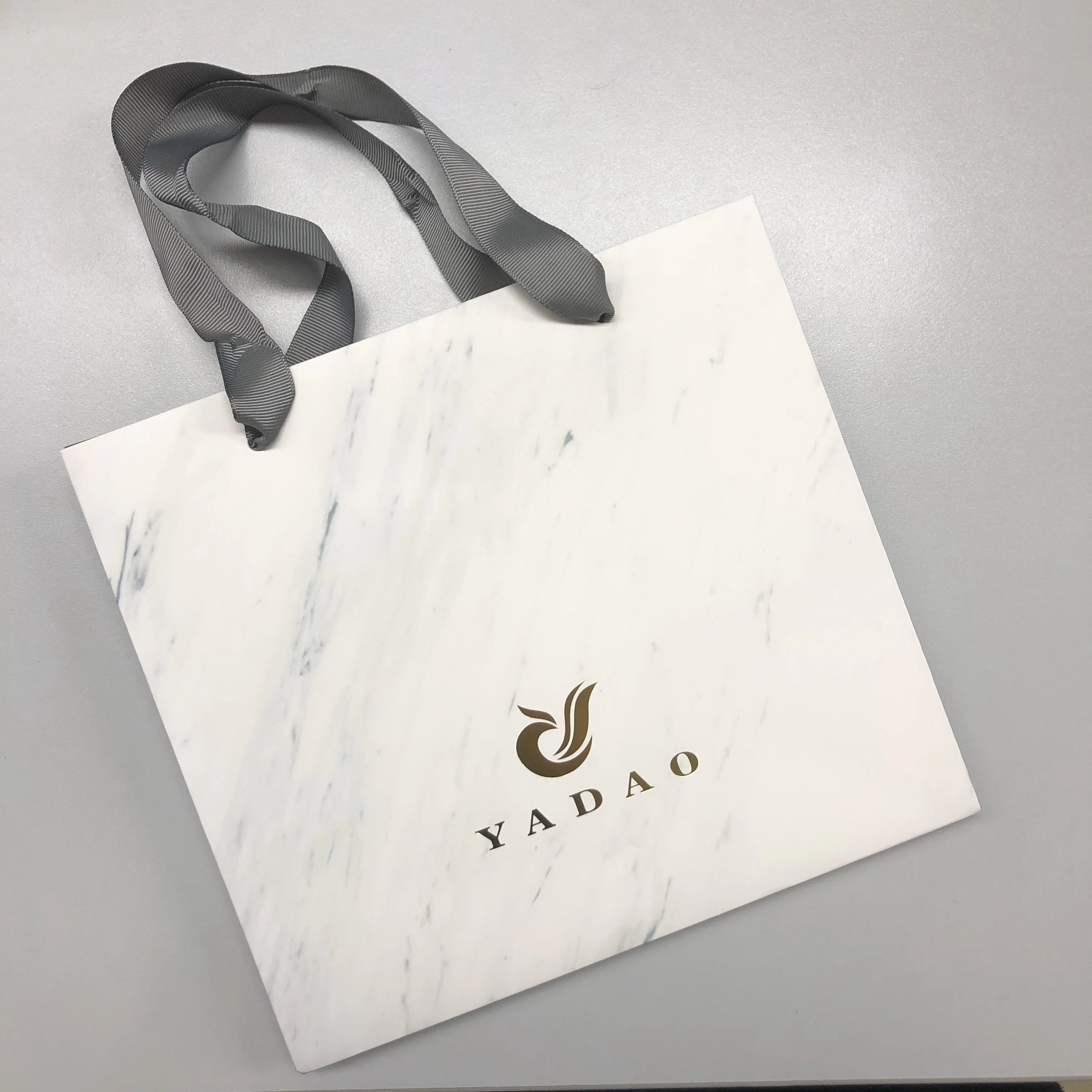 Yadao handmade shopping bag marble texture printing paper bag with hot stamping logo and ribbon handle