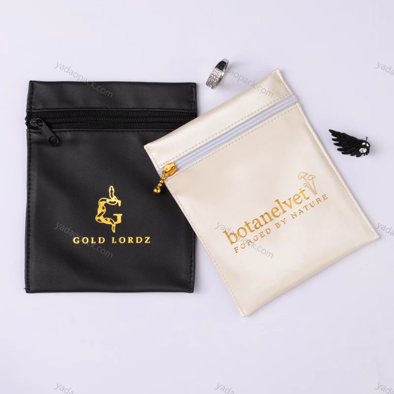 customize jewelry packaging bag pu leather pouch bag snap design packaging jewelry with debossed logo on