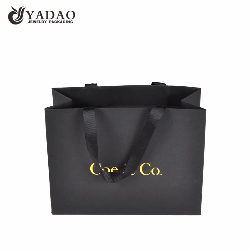 fancy paper bag ribbon handle shopping paper bag texture finish paper packaging bag
