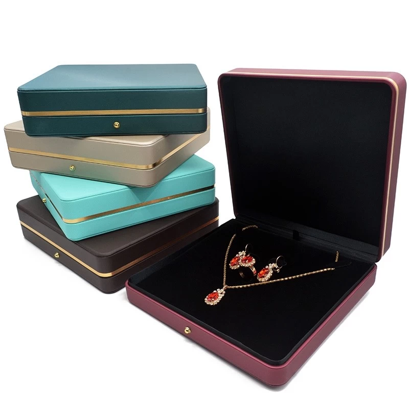 luxury quality jewelry packaging box plastic jewelry box coffee brown color jewelry box stocks gift packing with gold rim
