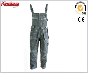 Čína Vysoce kvalitní pánské kalhoty s náprsenkou na pracovní oděvy s potištěným logem na plátně výrobce