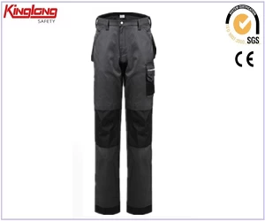 China Calças usáveis ​​de segurança de mineração durável, calças uniformes de trabalho com bolsos destacáveis, calças cargo com vários bolsos fabricante
