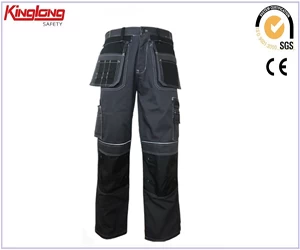 porcelana Pantalones cargo de alta calidad a precio económico para hombres y mujeres, pantalones de trabajo con múltiples bolsillos fabricante