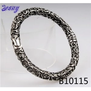 Китай wholesale vintage engraved flower magnetic health bracelet B10115 производителя