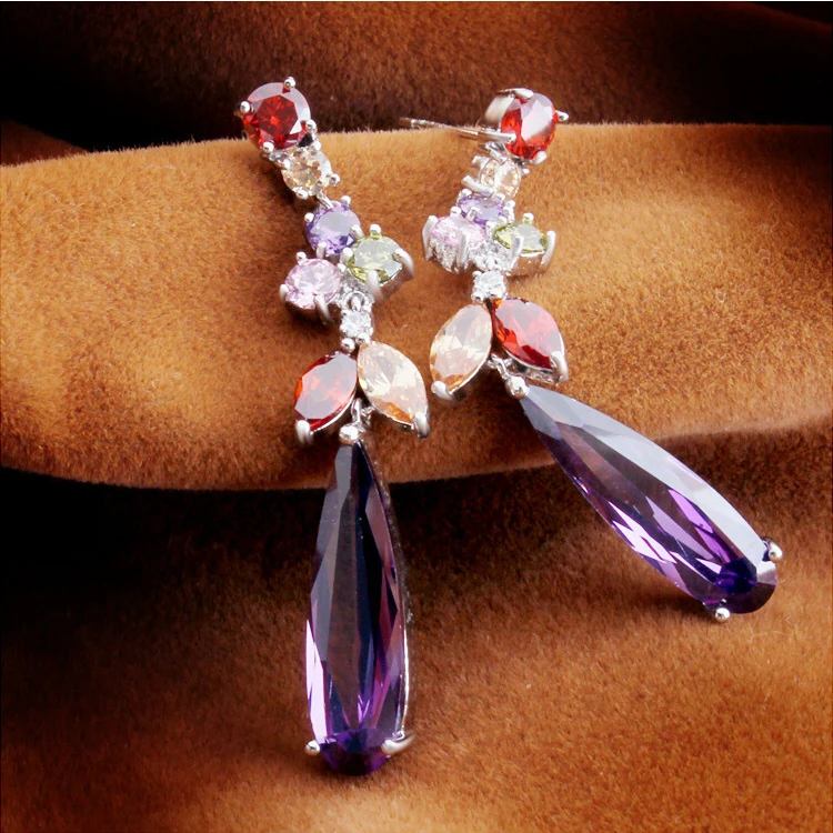 سحر الذهب مطلي الملونة الراقية الراقية الزفكون طويلة تتدلي قطره الأقراط النساء أزياء الزفاف المجوهرات