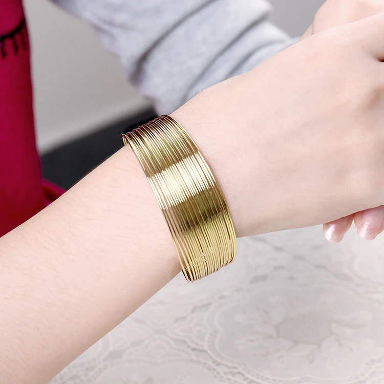 China manufacturer wholesale fashion jewelry yellow gold bangle bracelet for women