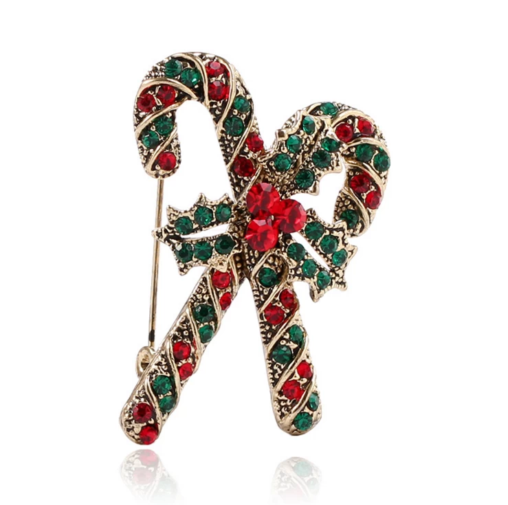 porcelana Hot style popular New Year clothes and decorations creative Christmas cane brooch happy new year brooch fabricante