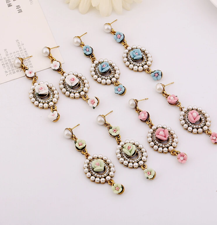 Palace retro temperament earrings Europe and the United States new sea Amoy soft pottery environmental water droplets alloy pearl gold studs earrings