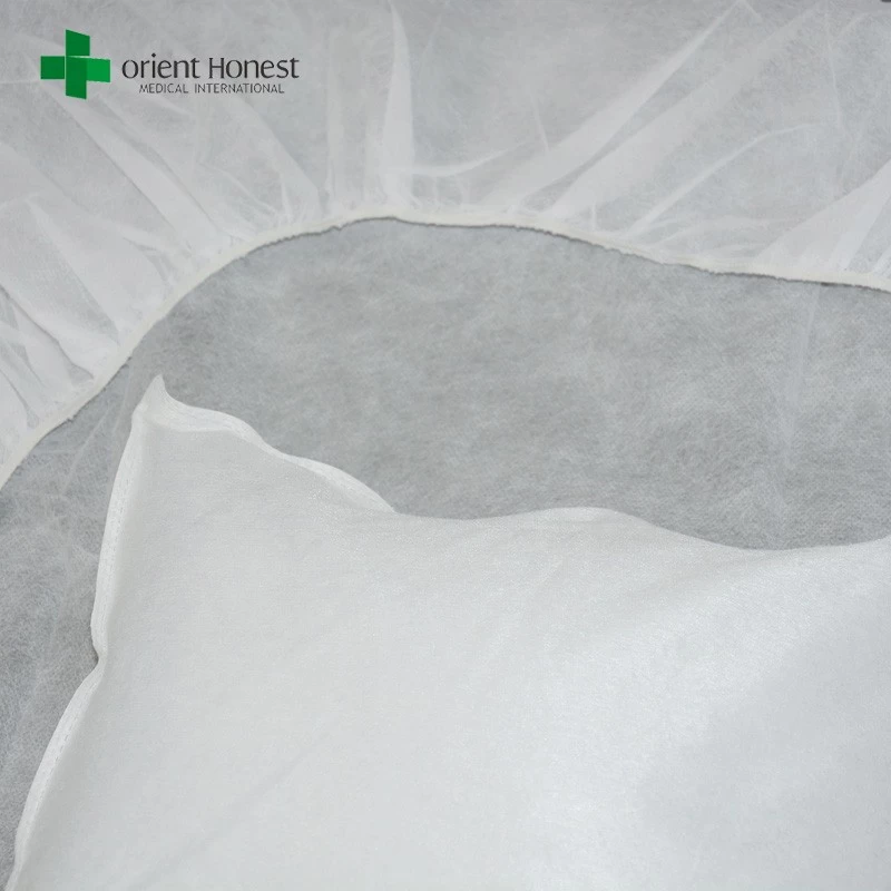 Flame resistant disposable pillow cover and bed sheet , cheap price disposable hotel bed sheets , disposable non woven bed sheet set manufacturer