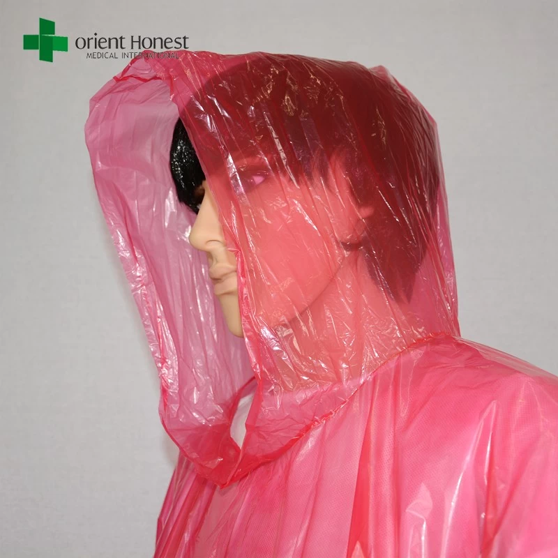 LDPE transparent plastic rain suits,China supplier plastic raincoat with hood,clear red disposable emergency poncho