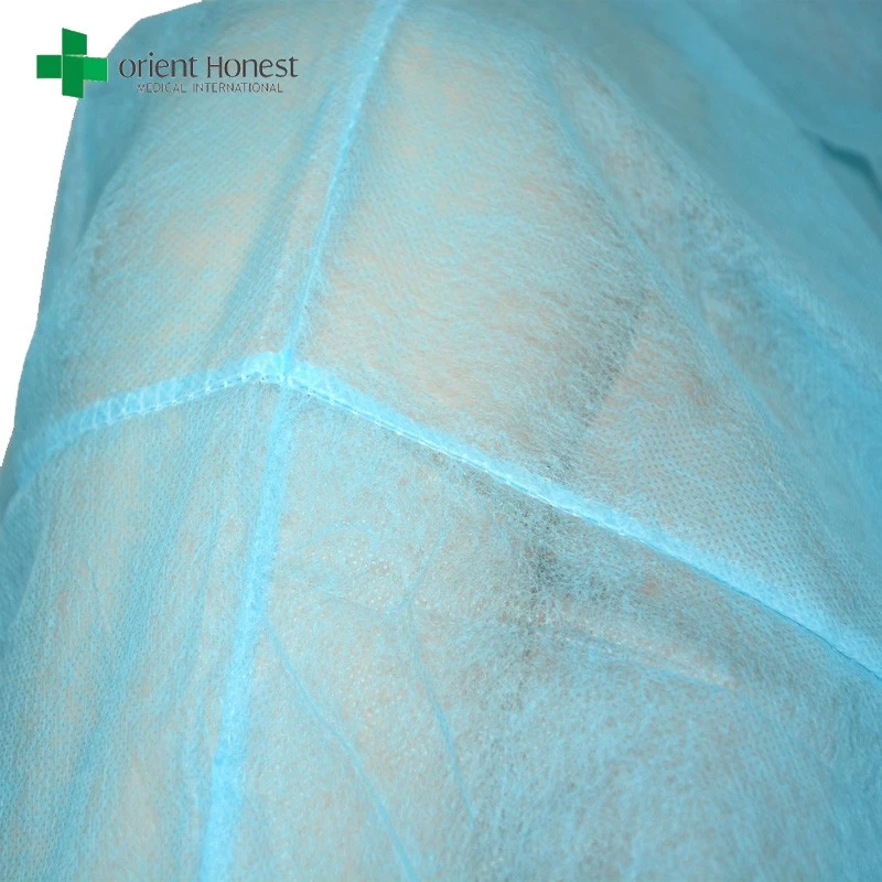 Biodegradable non woven disposable lab coat with four snaps for factory work shop hospital