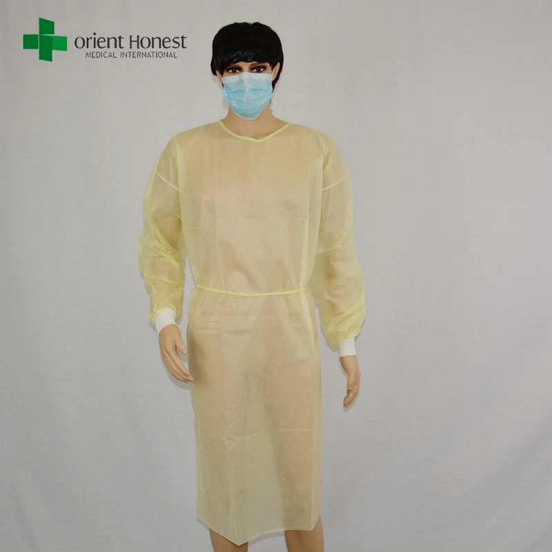 China Gelb pp Isolation Kleid Lieferanten, pp OP-Kittel für den Arzt, preiswerte Einweg-medizinische Bekleidung Hersteller