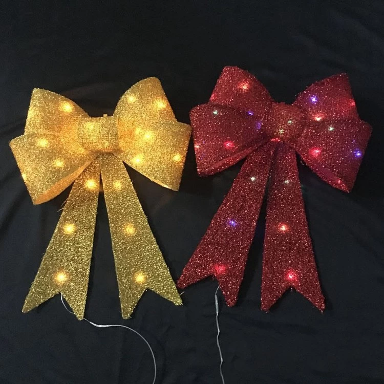 China 18inch 24inch large led christmas bow for xmas tree wreath front door hanging decoration fabricante