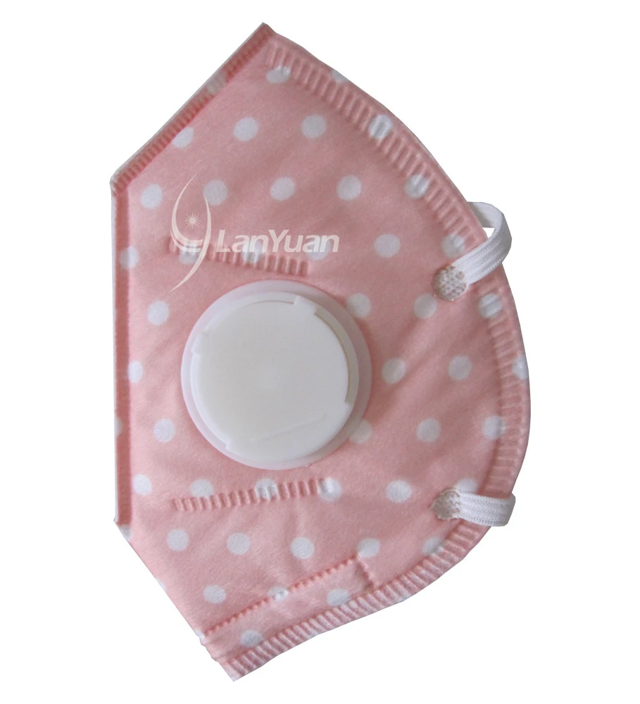 Peach Nonwoven Face Mask with White Dots Pattern and Valve