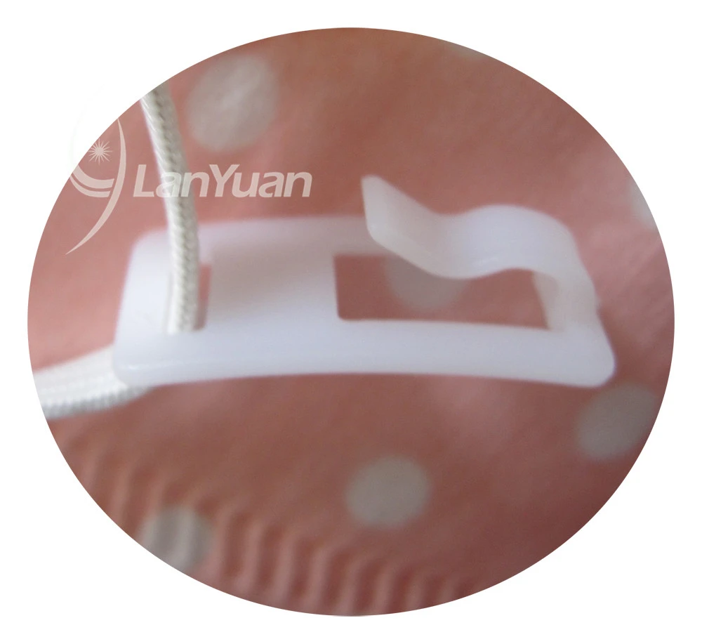 Peach Nonwoven Face Mask with White Dots Pattern and Valve