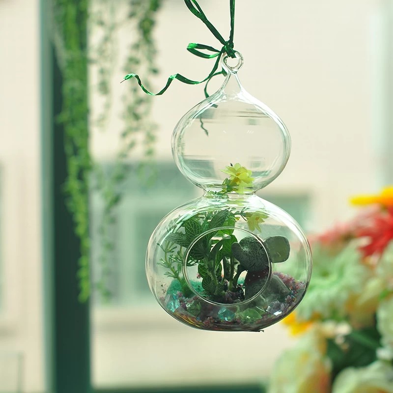 Hanging glass ball candle holders