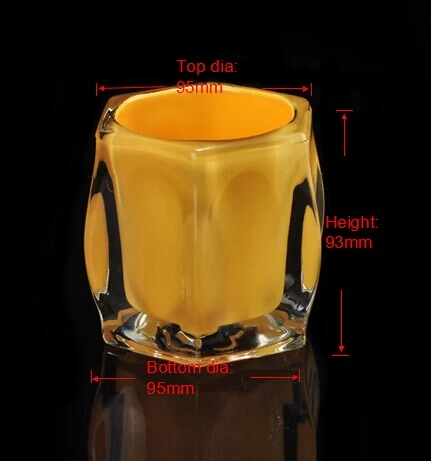 Yellowish clear round votive glass candle holder
