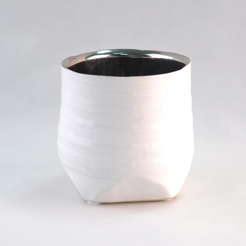 White candle holders with unique bottom