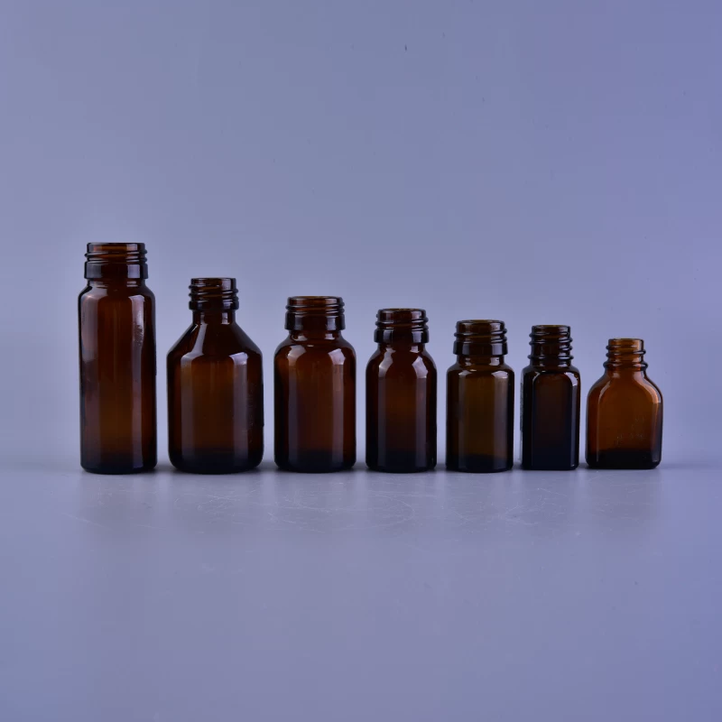 Empty small amber glass medicine bottle