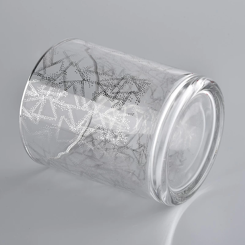 transparent glass candle jar with silver shiny patterns
