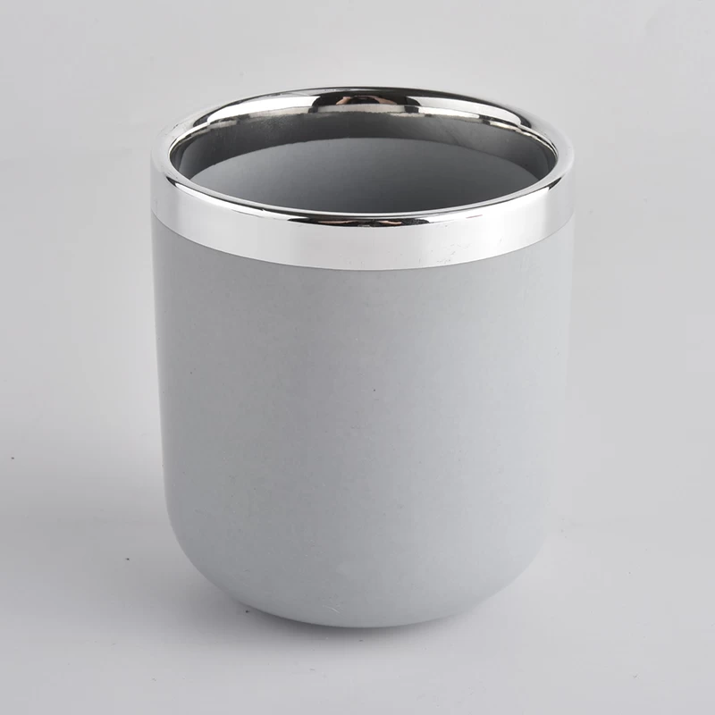 grey ceramic candle jar wih silver rim