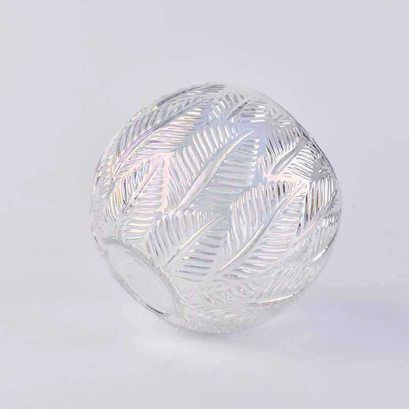 Iridescent white ball glass candle holder with leaves pattern