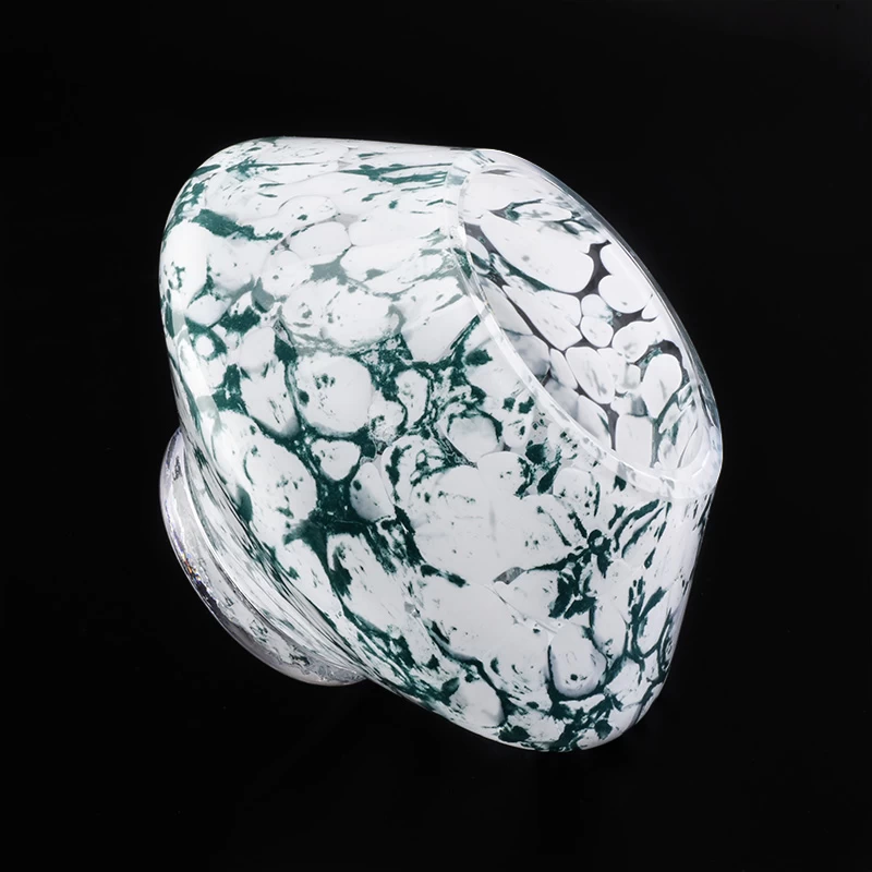 glass candle jar with unique green pattern 