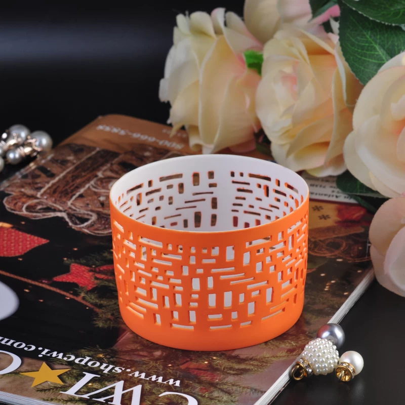 Colored hollowed-out ceramic candle holder