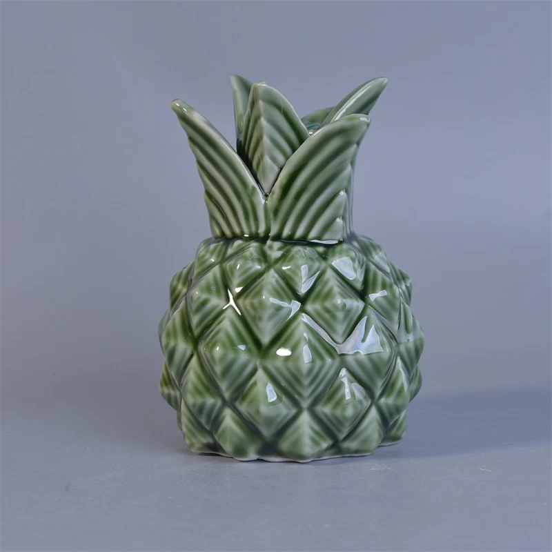 Green pineapple shaped ceramic diffuser bottles with reed