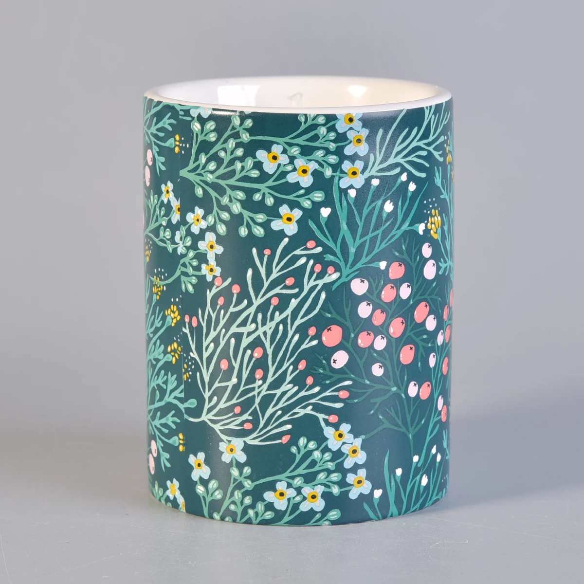 ceramic candle vessel with coloful printing