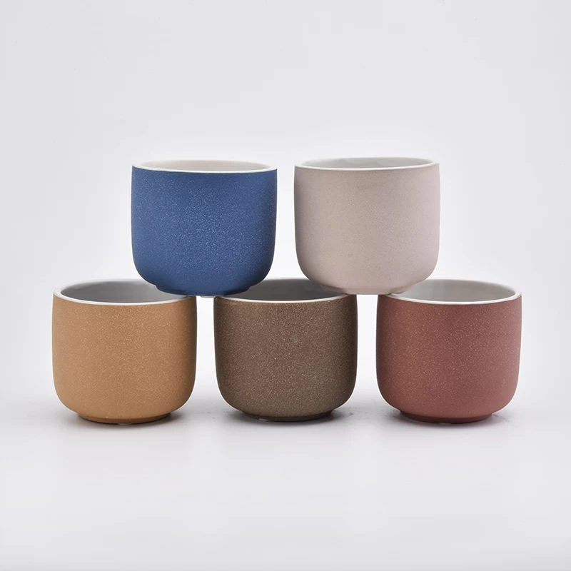 New arrival sanding color ceramic candle jars wholesale