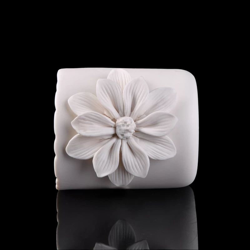 white ceramic flower candle holder