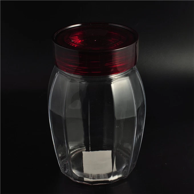 Round glass jar with color lid