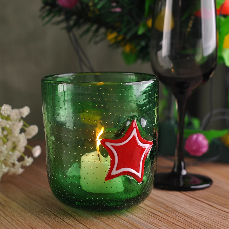 Green color glass candle holder with star