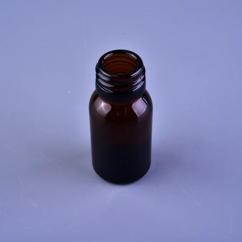 Small screw top amber glass bottle for medicine 