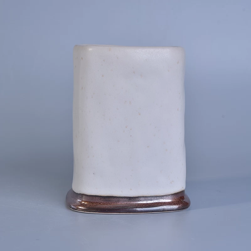 white glazed square candle jar