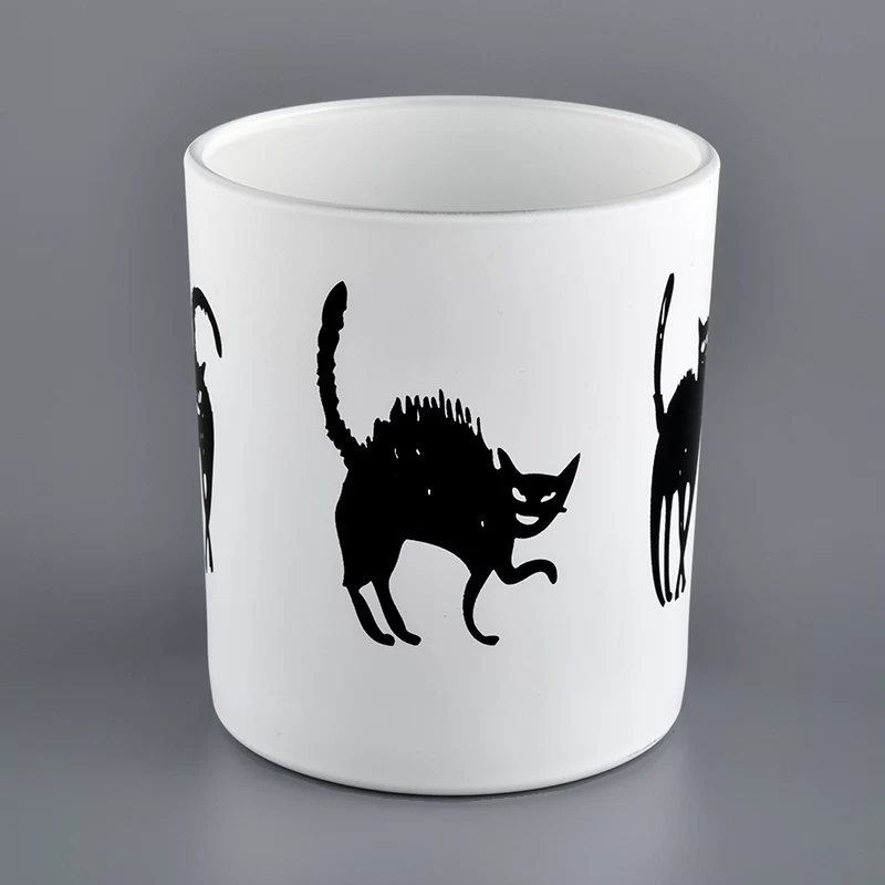White glass candle holder with black cat pattern
