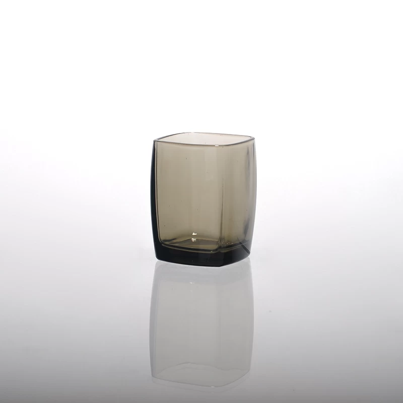 Gray colored glass candle holder