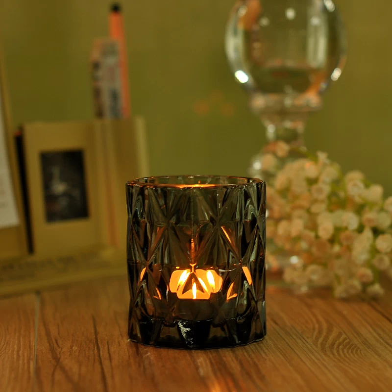 Diamond pattern engraved glass candle holder