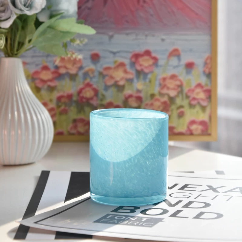 blue color material melted handmade glass candle jar