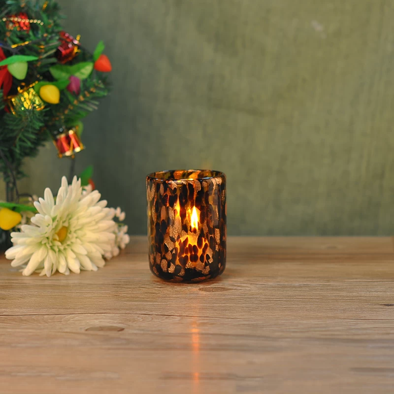 black solid glass candle holder with spots