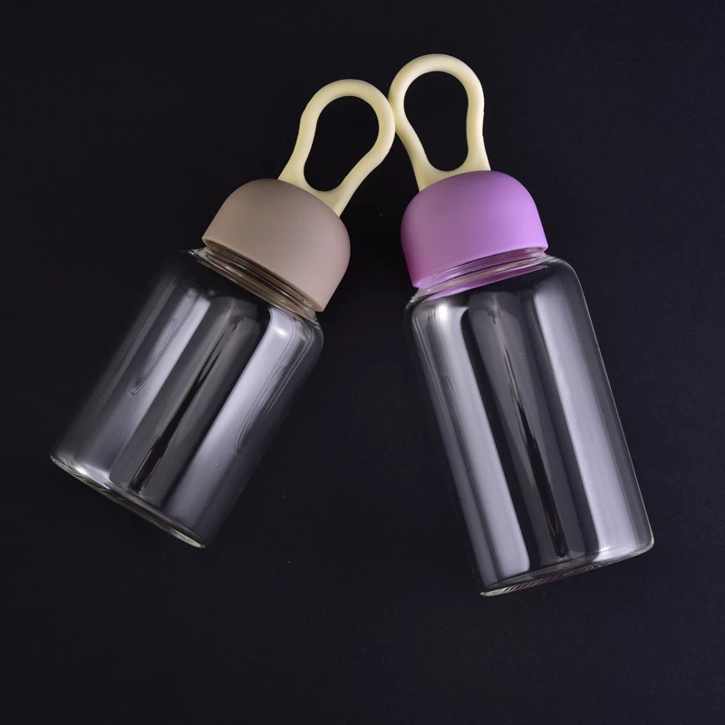 Glass water bottle with rubber lid