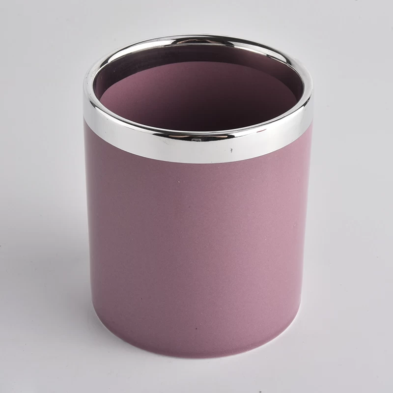pink colored ceramic candle jars with silver rim