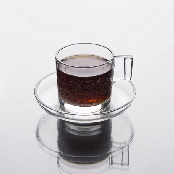 Glass coffee cup with saucer