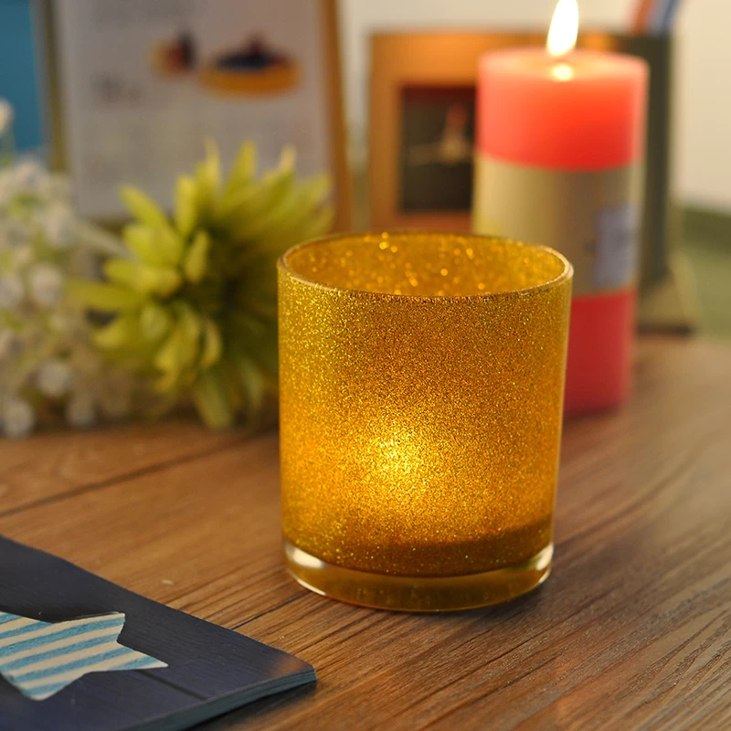  Glass candle holder with golden glitter