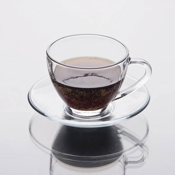Glass coffee cup with saucer